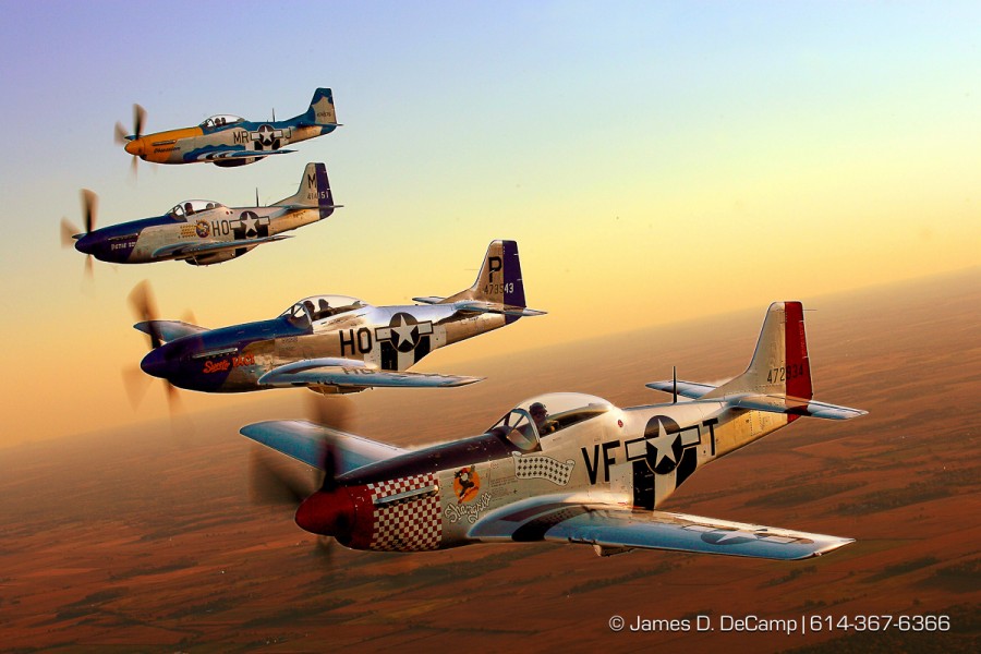 A formation of P-51 Mustangs flies next to my B-25 Mitchell bomber for a photo op over the skies of Pickaway county late Friday afternoon September 28, 2007 during the 2007 gathering of Mustangs & Legends air-show going on at Rickenbacker ANGB all this weekend. (© James D. DeCamp 614-367-6366)