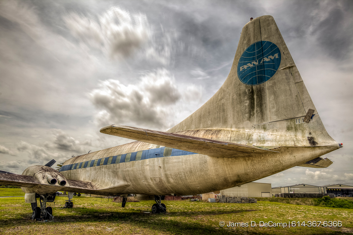 A Pan Am Convair 240 photographed Tuesday May 17, 2016 at the Orlando-Apopka Airport (X04). Pan American World Airways (Pan Am) Convair CV-240-0 N1022C (cn 147) This aircraft flew for American, Mohawk and Trans Florida Airlines and was to be displayed at the US Airline Industry Museum.(© James D. DeCamp | http://www.JamesDeCamp.com | 614-367-6366) Pilot behind vintage airliner saves memories of air travel's golden age LeRoy Brown, 92, had a flying career spanning almost 60 years April 12, 2013|By Stephen Hudak, Orlando Sentine The 44-passenger vintage airliner, a blue Pan Am logo tattooed on its tail, has proven to be every bit the attention-getter that LeRoy H. Brown envisioned when he parked it at Orlando-Apopka Airport about four years ago. Almost daily, someone calls to ask about the 1940s-era plane after seeing it from U.S. Highway 441, he said. Who owns that old plane? Why is it sitting out there? Can we go inside? "It's a museum piece, just like I am," said Brown, 92, whose flying career began at age 14 in the seat of a crop-duster and spanned almost 60 years. From a seat in the cockpit, the former Pan Am captain witnessed the nation's transition from propeller-driven planes to turbine-powered jets that streak across the skies. As co-founder, president and chief curator of the Apopka-based U.S. Airline Industry Museum, a pie-in-the-sky operation that, he acknowledged, needs "an angel with money" to survive, Brown brought the refurbished airliner to a spot along 441 that thousands of motorists pass every day. He estimated that the Convair 240 has cost the not-for-profit museum foundation about $60,000 to acquire, disassemble, transport and reassemble at the Apopka airport. It will never take flight again, but Brown hopes it will stand as a symbol of flying days gone by. Like Brown, the plane, which was delivered to American Airlines on Feb. 27, 1949, recalls a time when air travelers were served an in-flight meal of filet mignon in bordelaise sauce in