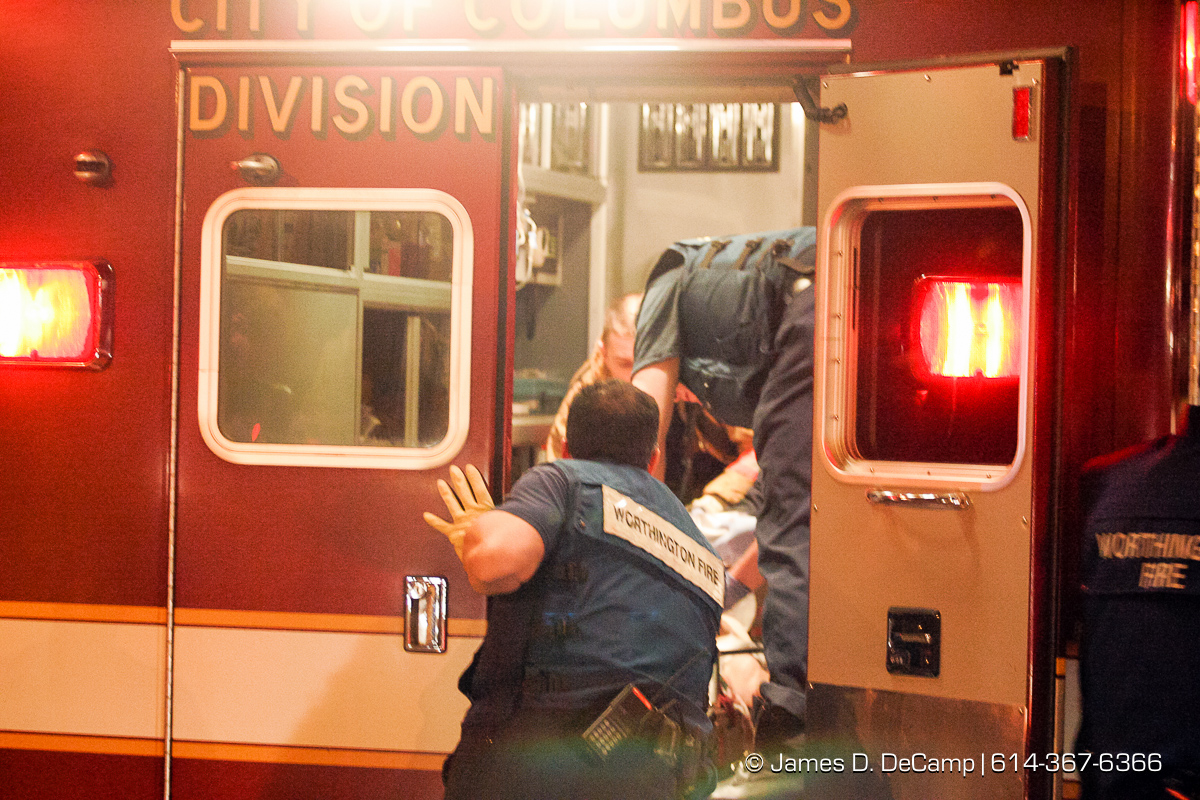 Columbus, Worthington & Clinton Twp Medics work on one of seven shooting victims at the Alrosa Villa, 5055 Sinclair Road late Wednesday night December 8, 2004. (© James D. DeCamp | http://www.JamesDeCamp.com | 614-367-6366)