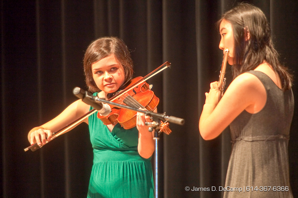 Jennifer Zhou and Jill Valentine perform at the Upper Arlington High School Graduation Ceremony held Sunday afternoon June 6, 2010 at the Veterans Memorial Auditorium in Downtown Columbus. (© James D. DeCamp | http://JamesDeCamp.com | 614-367-6366)