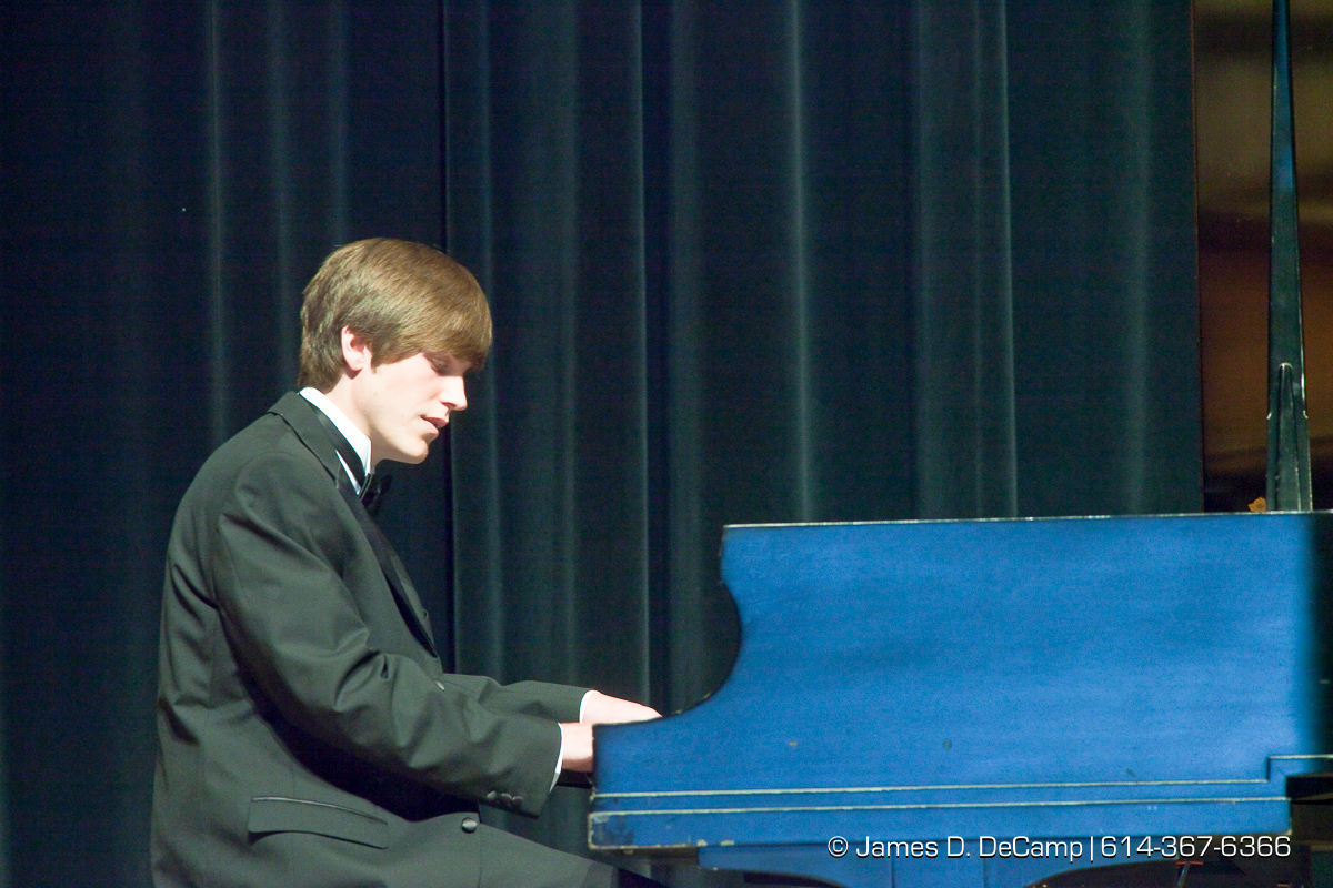 Sean Mills performs an Elton John number at the Upper Arlington High School Graduation Ceremony held Sunday afternoon June 6, 2010 at the Veterans Memorial Auditorium in Downtown Columbus. (© James D. DeCamp | http://JamesDeCamp.com | 614-367-6366)