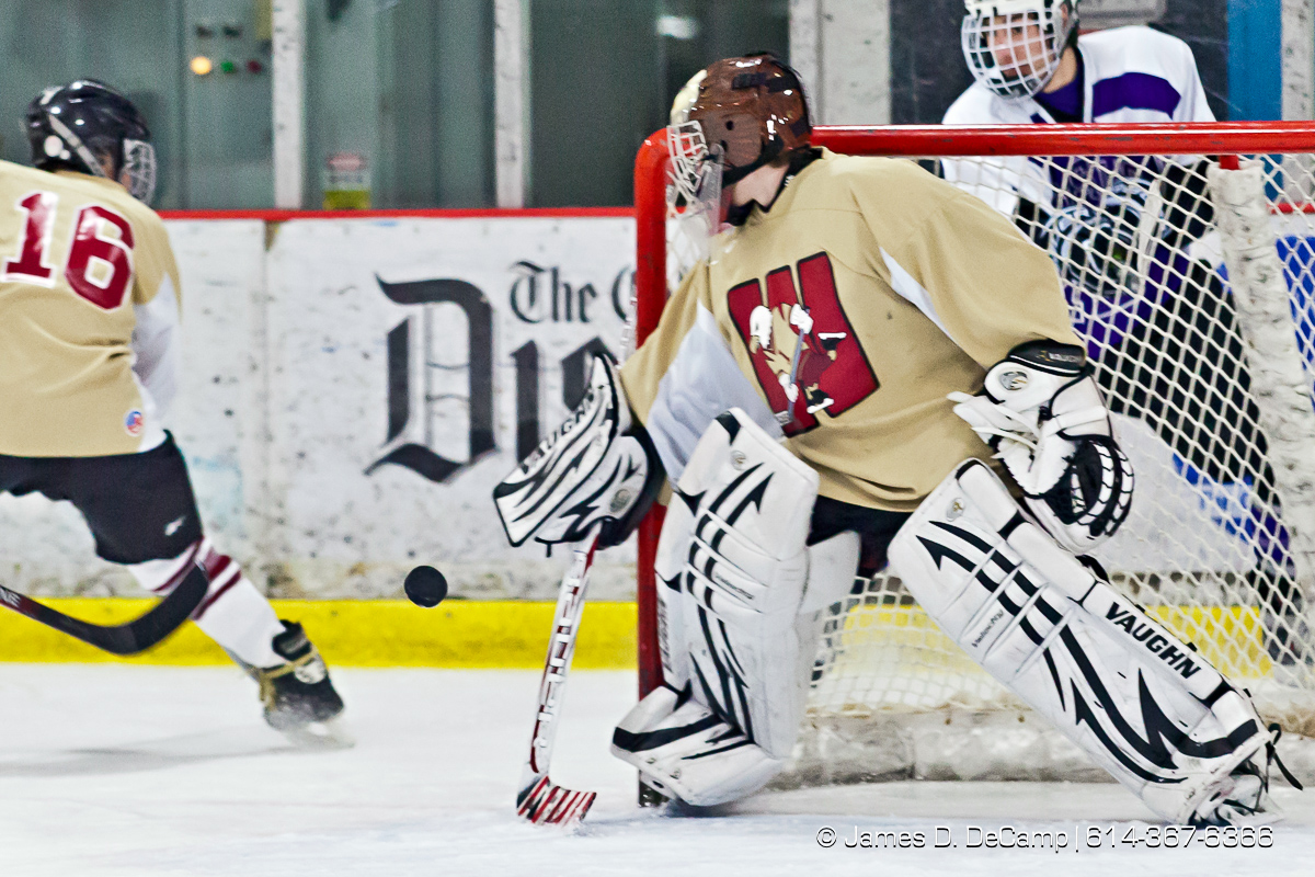 Bishop Waterson's (##) and DeSales' (##) in the first period of play at the Easton Chiller Jan. 28, 2012. (© James D. DeCamp | http://JamesDeCamp.com | 614-367-6366)