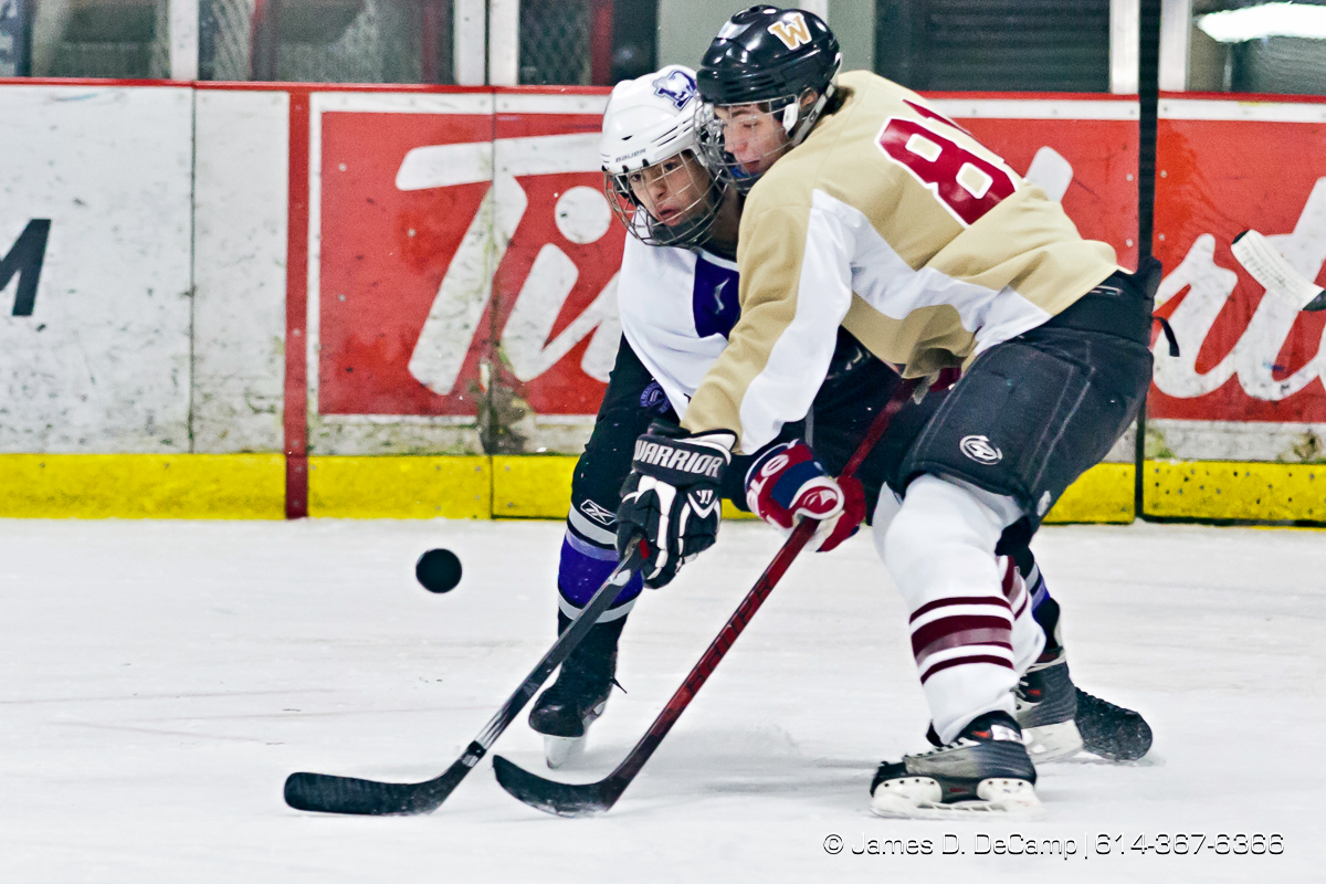 Bishop Waterson's (##) and DeSales' (##) in the first period of play at the Easton Chiller Jan. 28, 2012. (© James D. DeCamp | http://JamesDeCamp.com | 614-367-6366)