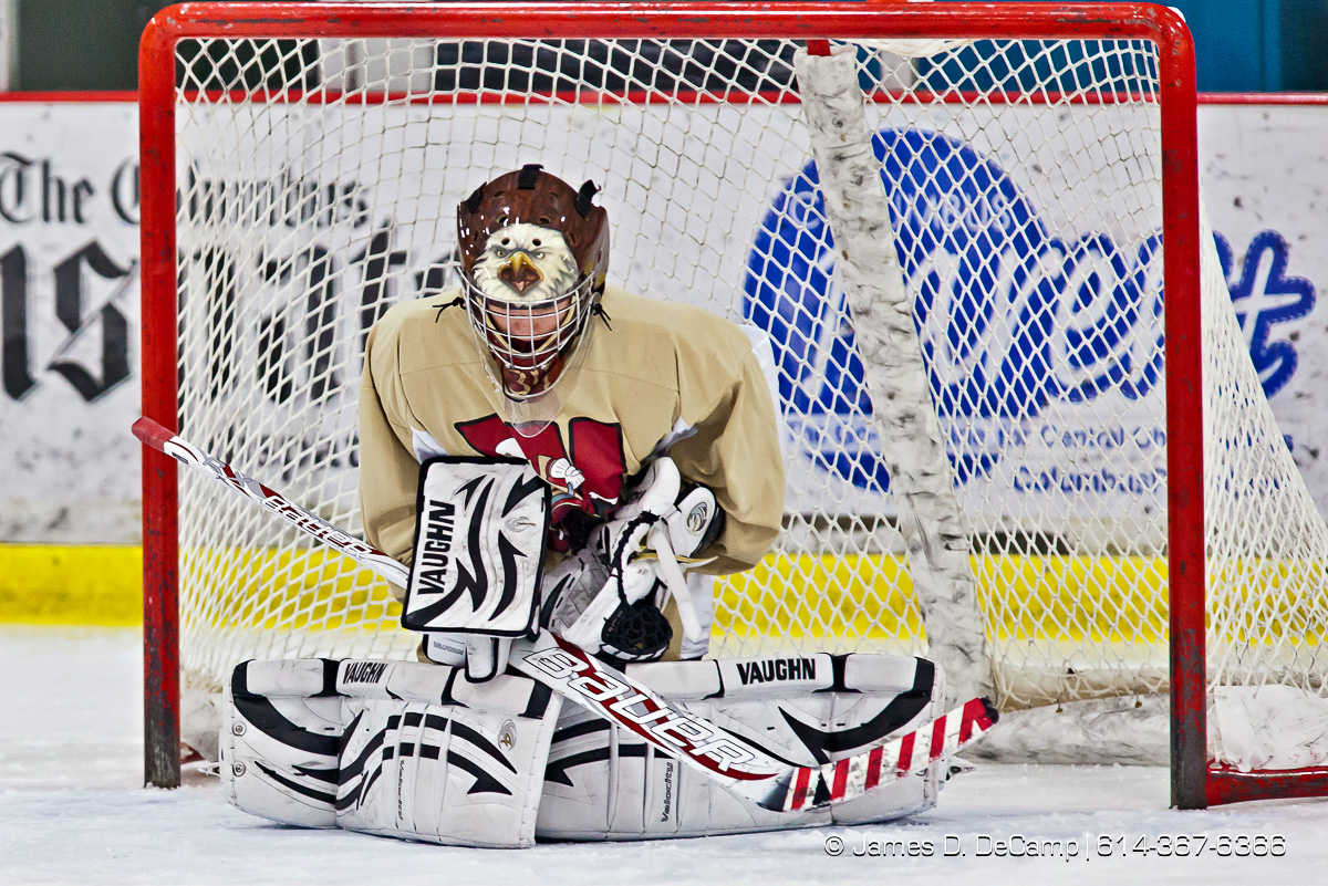 Bishop Waterson's Goalie Aaron King (34) takes a DeSales' puck in the chest in the first period of play at the Easton Chiller Jan. 28, 2012. (© James D. DeCamp | http://JamesDeCamp.com | 614-367-6366)
