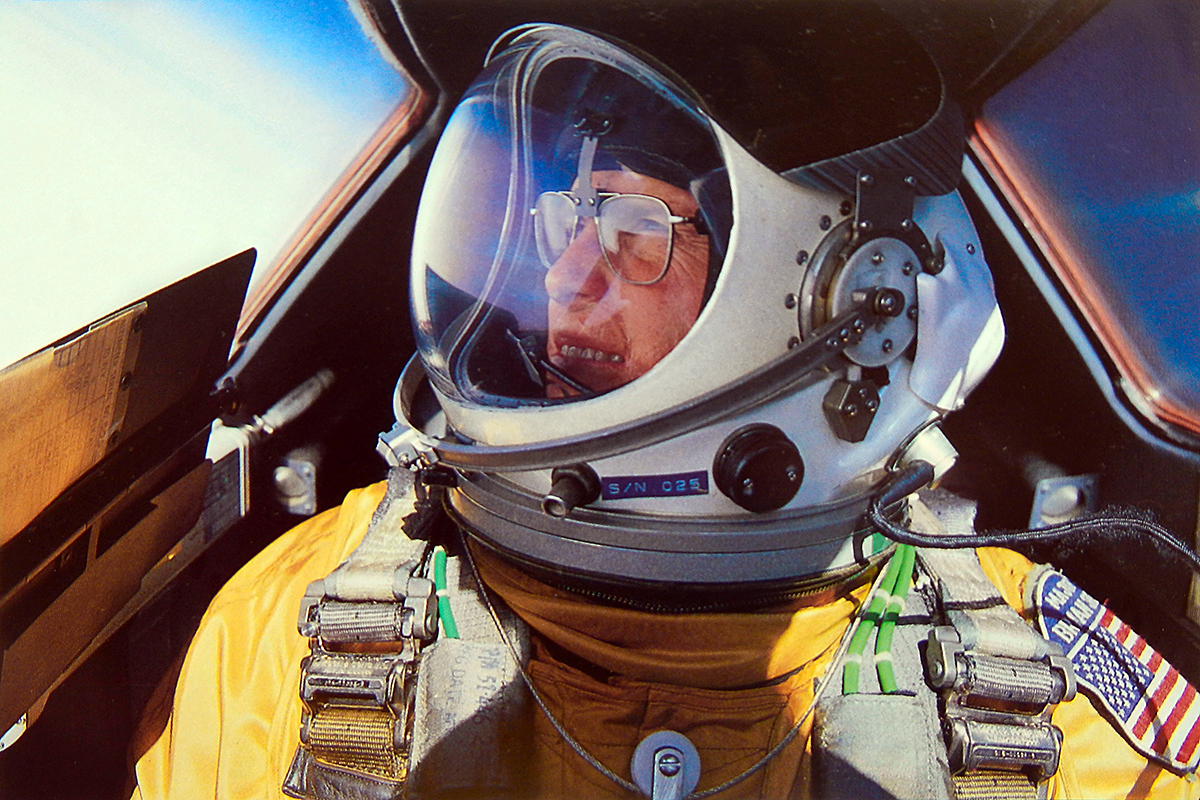 A self-portrait of Brian Shul in full flight suit gear within the cockpit of the SR-71 Blackbird. Public domain photo courtesy of Wikipedia. (https://en.wikipedia.org/wiki/Brian_Shul)