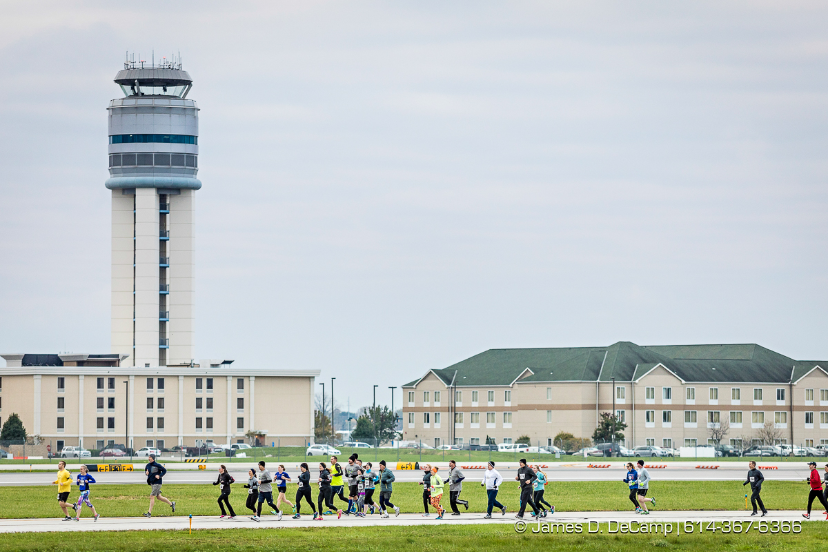 The John Glenn International Runway 5K Run & Walk photographed Sunday, October 29, 2017 at John Glenn Columbus International Airport. All proceeds were donated to Honor Flight Columbus, a nonprofit organization that provides senior veterans with a day in the nation’s capital to visit the memorials built in their honor. (© James D. DeCamp | http://JamesDeCamp.com | 614-367-6366)