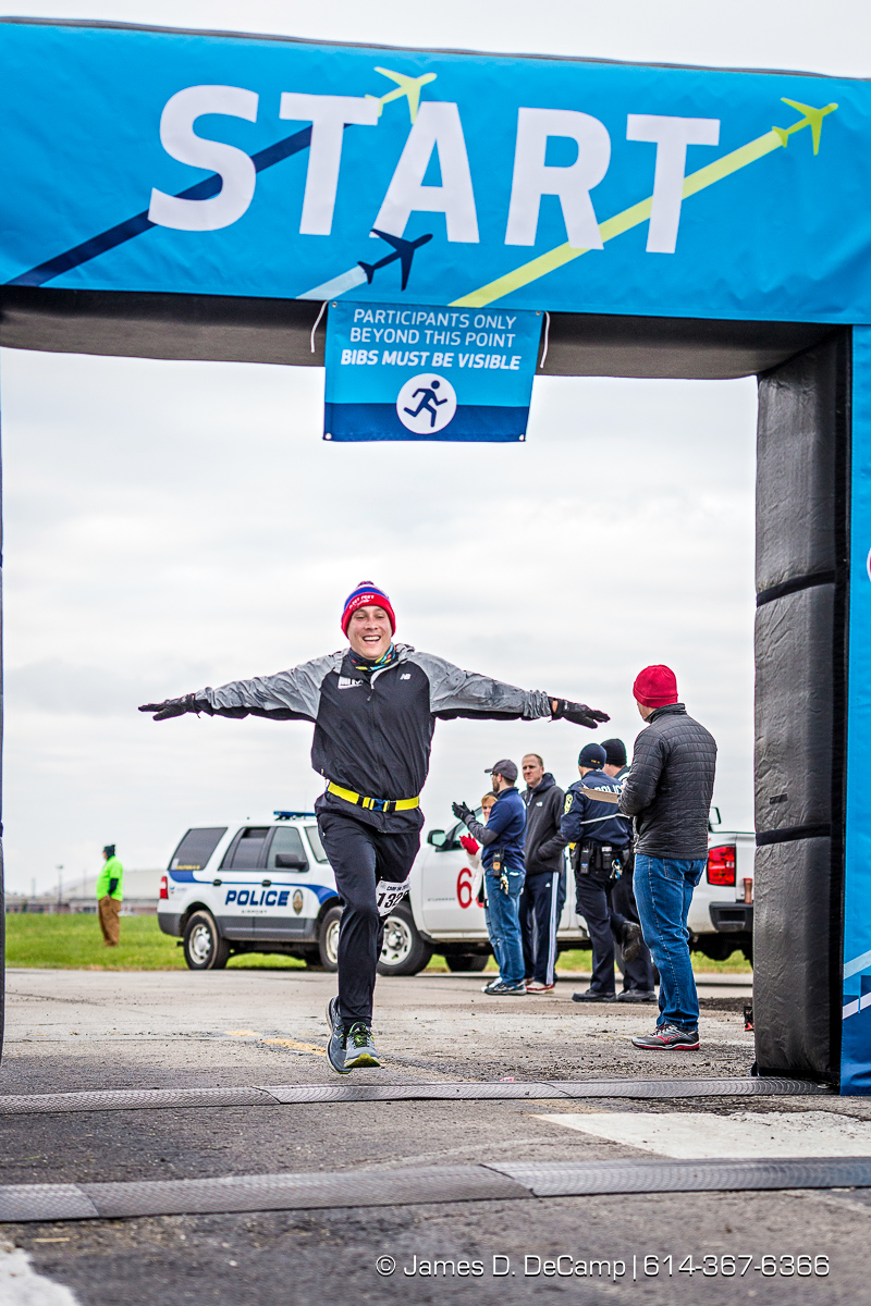 The John Glenn International Runway 5K Run & Walk photographed Sunday, October 29, 2017 at John Glenn Columbus International Airport. All proceeds were donated to Honor Flight Columbus, a nonprofit organization that provides senior veterans with a day in the nation’s capital to visit the memorials built in their honor. (© Lexi Browning | http://JamesDeCamp.com | 614-367-6366)