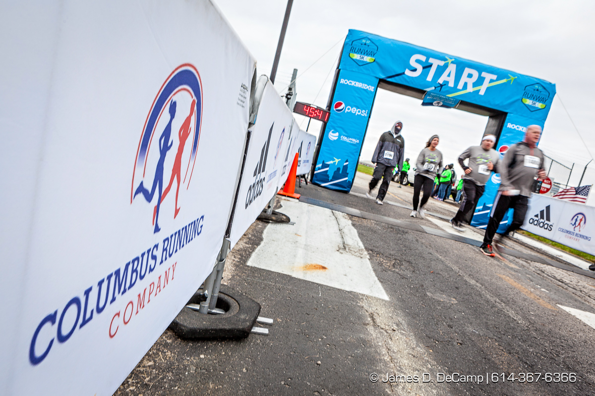 The John Glenn International Runway 5K Run & Walk photographed Sunday, October 29, 2017 at John Glenn Columbus International Airport. All proceeds were donated to Honor Flight Columbus, a nonprofit organization that provides senior veterans with a day in the nation’s capital to visit the memorials built in their honor. (© James D. DeCamp | http://JamesDeCamp.com | 614-367-6366)