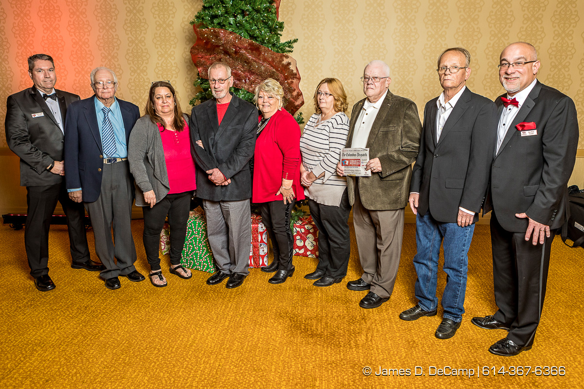 The second newspaper in the 2017 Clothe-a-Child Gala and 110th annual Charity Newsies Newspaper Auction was sold to The Eagles (l-r) Pat Conley, Robert Boham, Cheryl Diggs, Ron Thompson, Mary Trebacz, Denise Thompson, Dave Ward, Michael Howard and Tony Perez photographed Thursday, November 30, 2017 at the Hollywood Casino Ballroom. (© James D. DeCamp | http://JamesDeCamp.com | 614-367-6366)