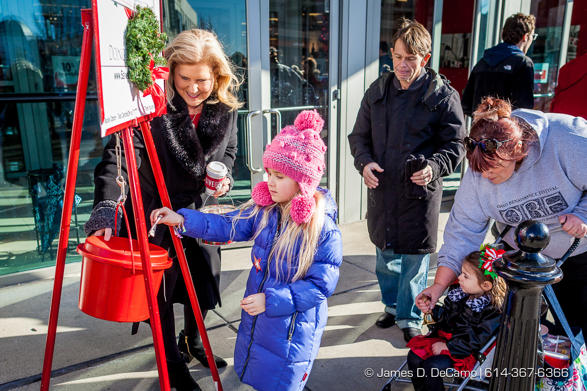Lu Ann Stoia manning the Salvation Army station at the Easton Town Center photographed Saturday, December 16, 2017. (© James D. DeCamp | http://JamesDeCamp.com | 614-367-6366)